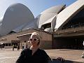 Christy seated before the Opera House 